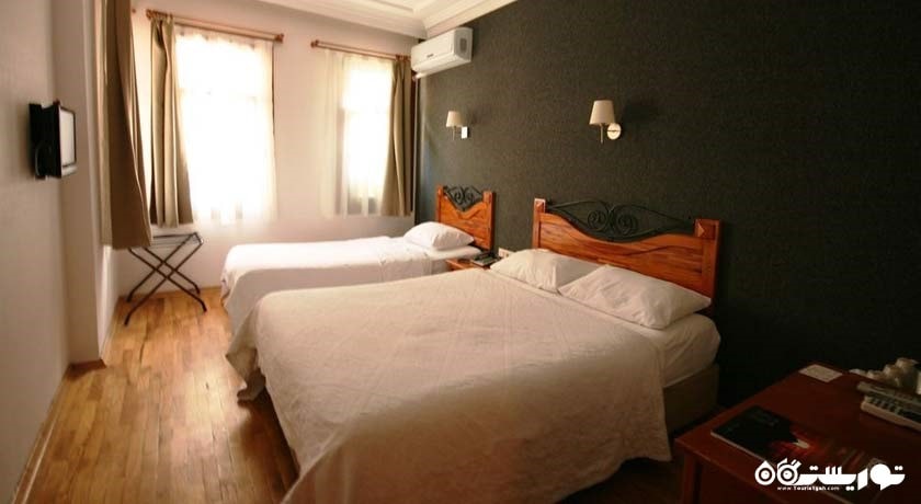 نمای تخت های اتاق تریپل	